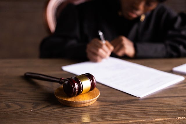 judge doing paperwork
