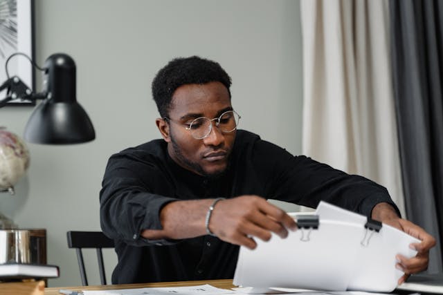 person looking at documents